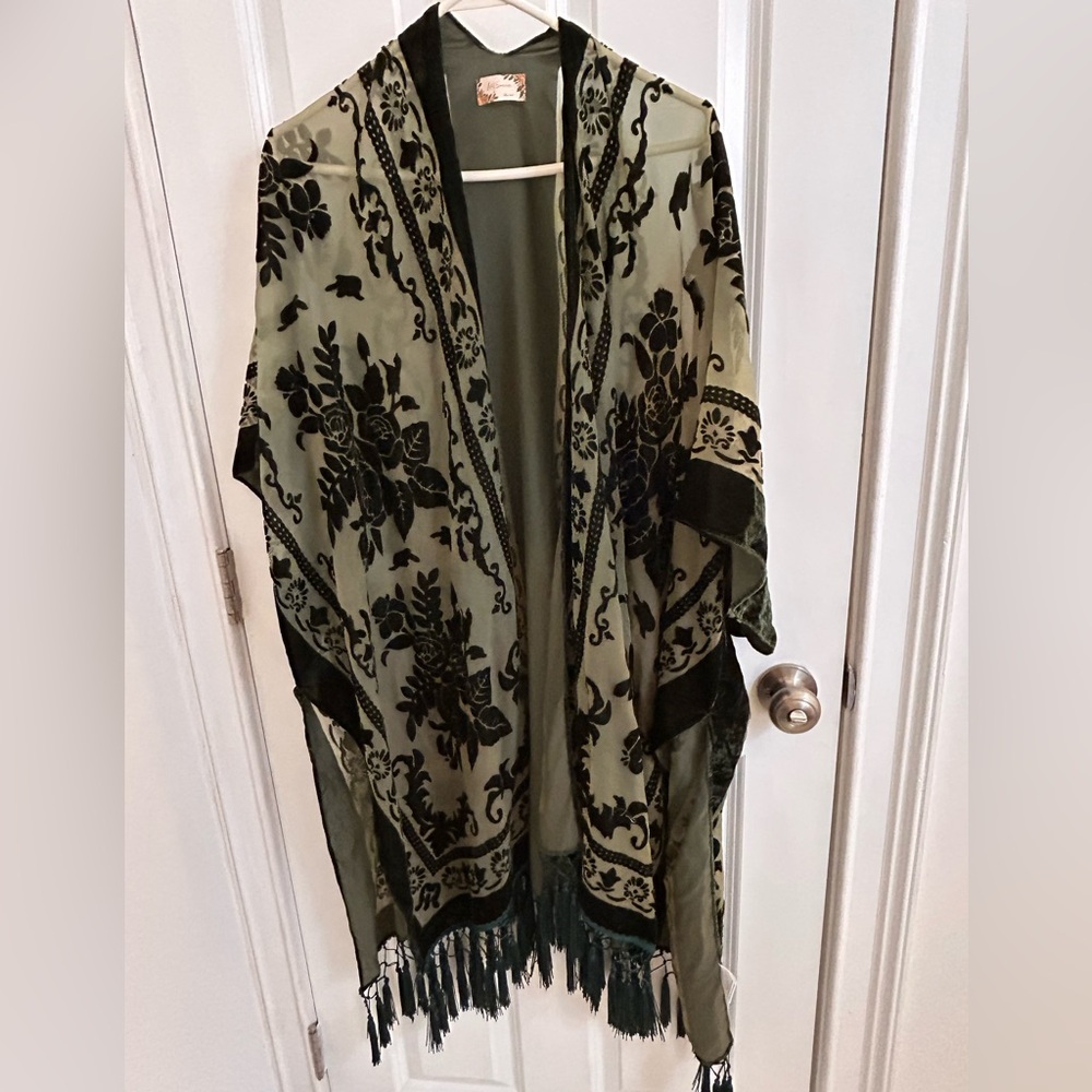 Burnout velvet topper with tassels.